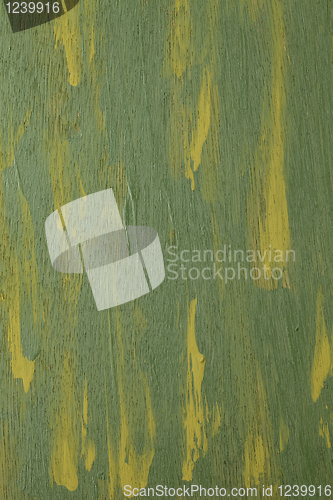 Image of green abstract painted  on wood