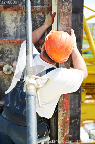 Image of builder at construction work