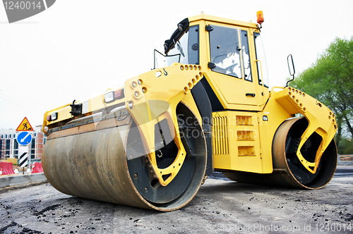 Image of compactor roller at asphalting work