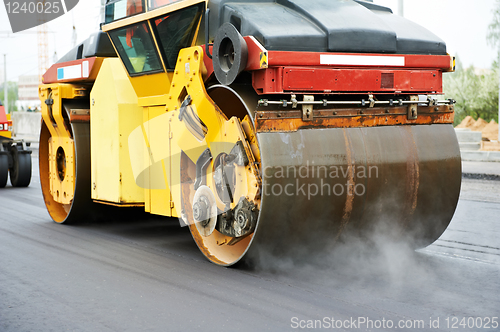 Image of compactor roller at asphalting work