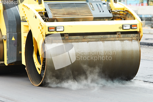 Image of compactor roller at asphalting work