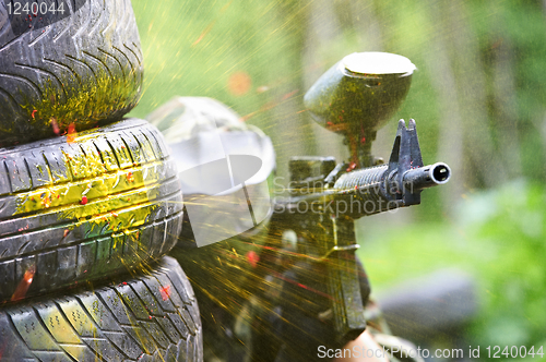 Image of paintball player under gunfire