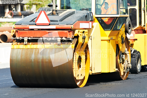 Image of asphalt roller compactor at work