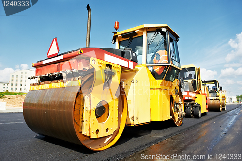 Image of asphalt roller at work