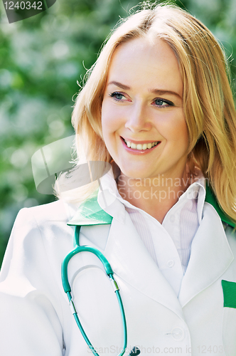 Image of woman doctor outdoors