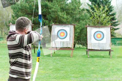 Image of Archer aiming with bow