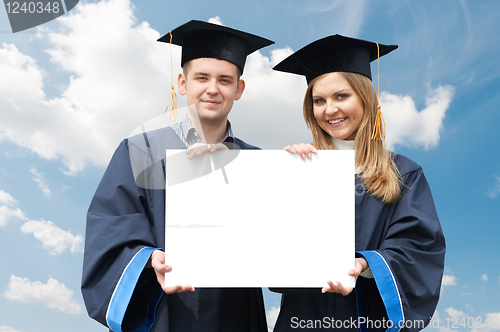 Image of graduate students with white board