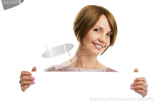 Image of woman holding board