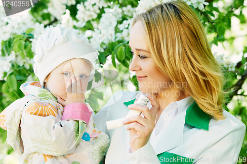 Image of Baby and doctor with inhaler