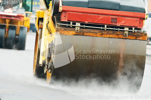 Image of compactor roller at asphalting work