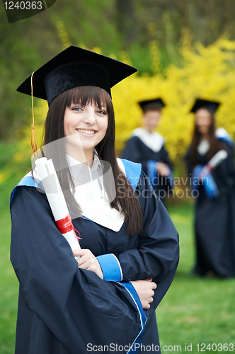 Image of one cheerful graduate girl