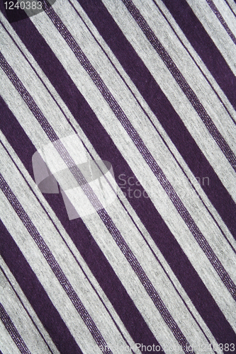 Image of Grey and lilac strips on the fabric as background 