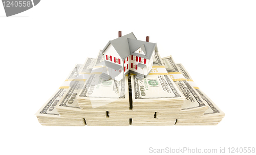 Image of Small House on Stacks of Hundred Dollar Bills