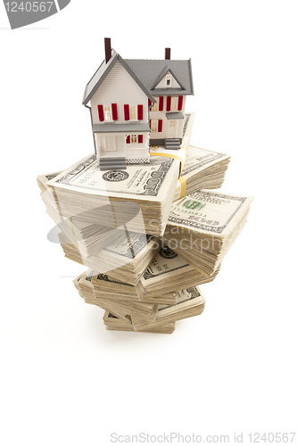 Image of Small House on Stacks of Hundred Dollar Bills