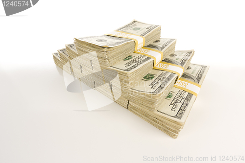 Image of Stacks of One Hundred Dollar Bills on Gradation