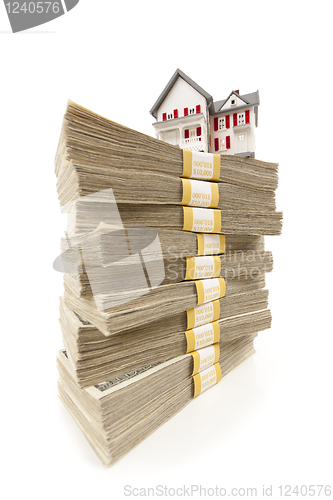 Image of Small House on Stacks of Hundred Dollar Bills