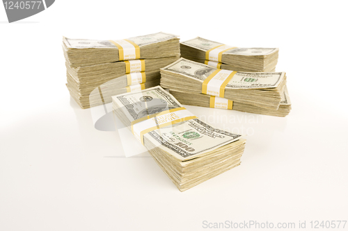 Image of Stacks of One Hundred Dollar Bills on Gradation