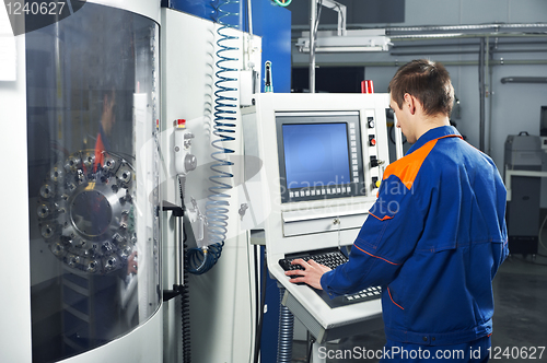 Image of worker at tool workshop