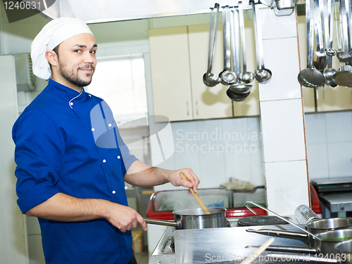 Image of chef boiling a soup