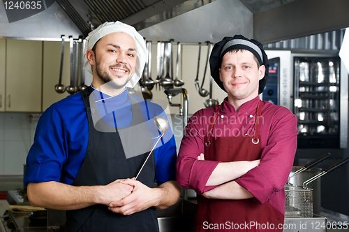 Image of chefs with scoop