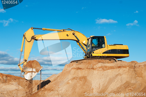 Image of track-type loader excavator at sand quarry