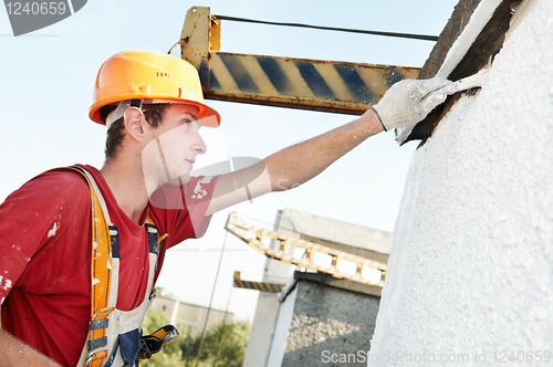 Image of builder facade painter at work