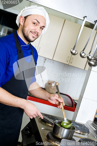 Image of chef with scoop