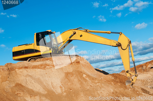 Image of track-type loader excavator at sand quarry