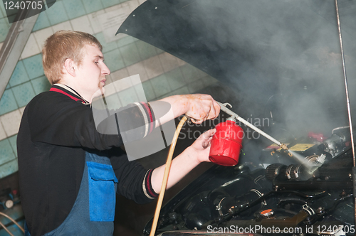 Image of manual car washing