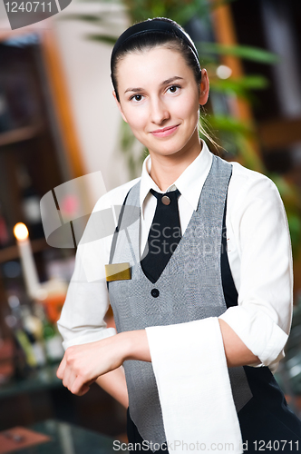 Image of Waitress girl of commercial restaurant