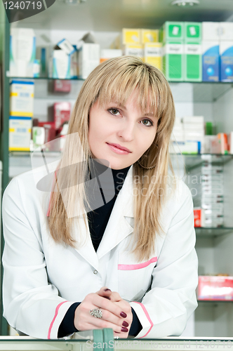 Image of Pharmacy chemist woman in drugstore