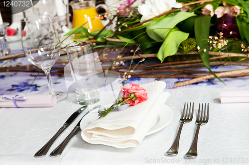 Image of catering table set with flowers