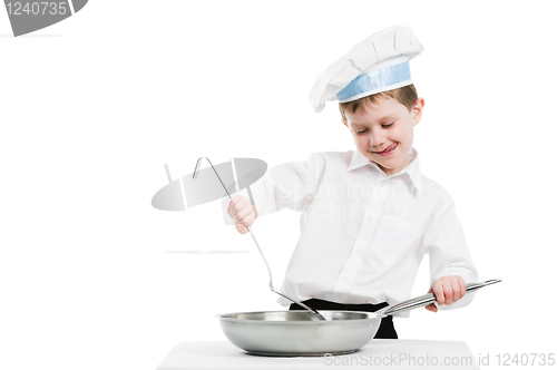 Image of chef with pan and trowel isolated