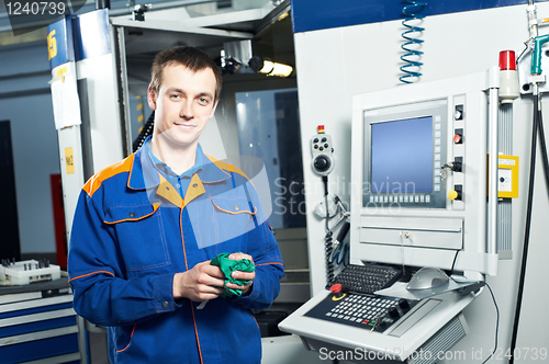 Image of worker at tool workshop