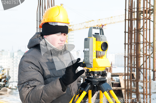 Image of Surveyor at work