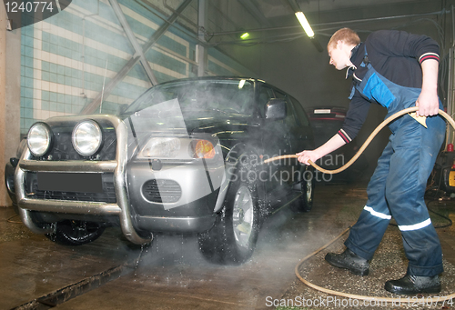 Image of manual car washing