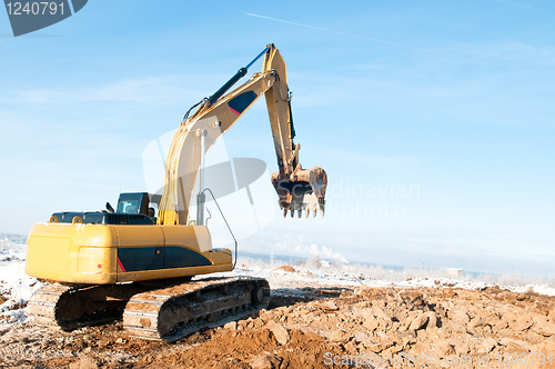 Image of excavator loader at winter works