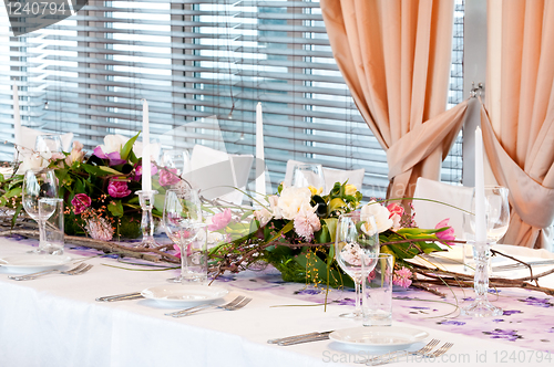 Image of catering table set with flowers