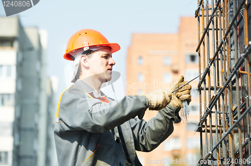 Image of construction worker making reinforcement