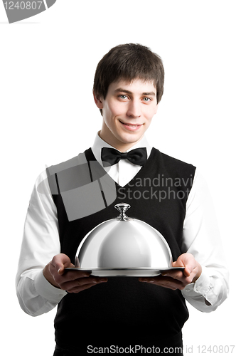 Image of Happy waiter with cloche lid cover