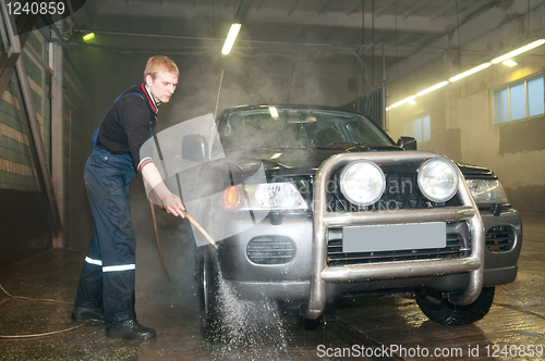 Image of manual car washing