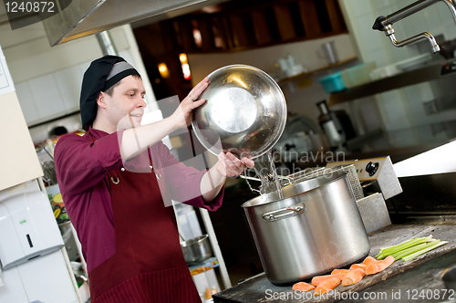 Image of chef at work in kitchen