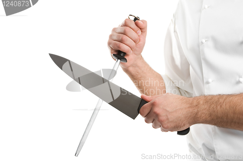 Image of chef hands with knife sharpen steel tool isolated