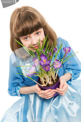 Image of little girl with crocus spring flower