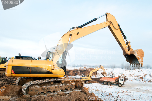 Image of excavator loader at winter works