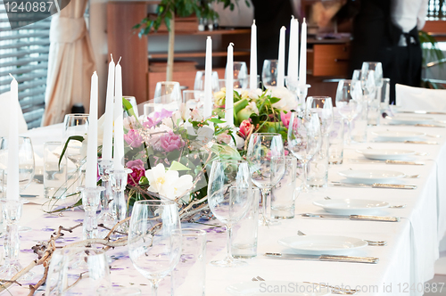 Image of catering table set with flowers