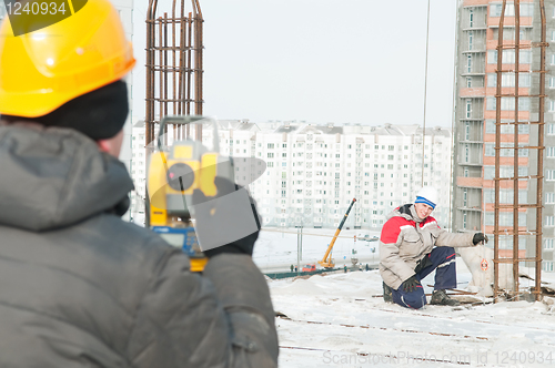 Image of Surveying works at construction site