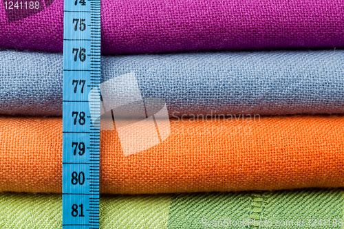 Image of Colorful cotton cloth with measuring tape