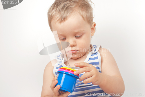 Image of boy with a toy