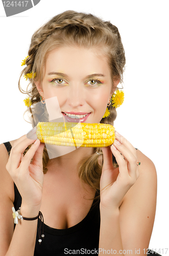 Image of woman eating corn-cob